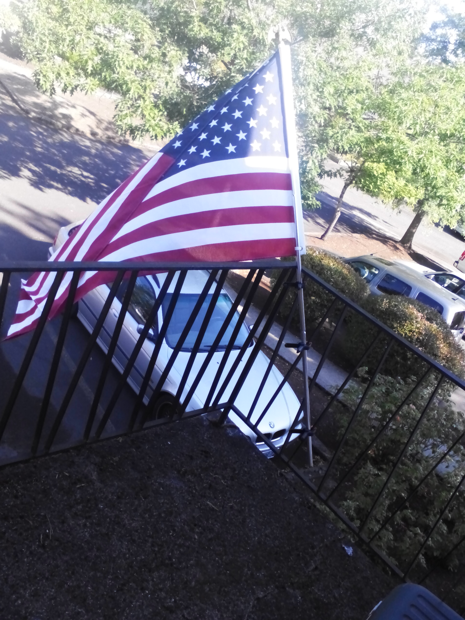 American Flag on an apartment balcony.