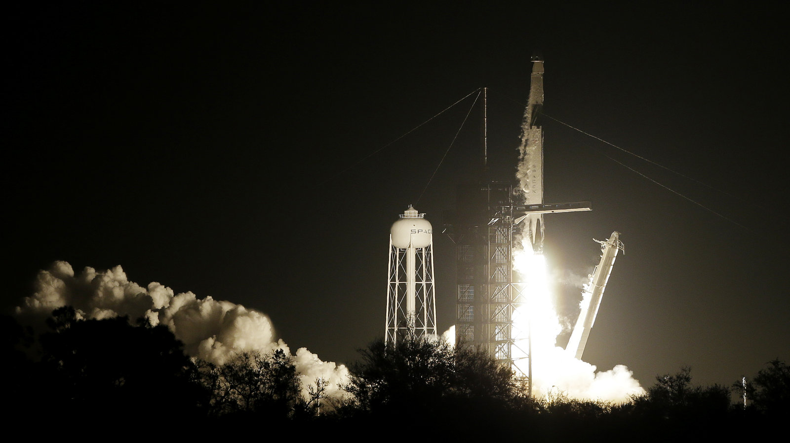 Space X Falcon 9 rocket with Dragon crew capsule.